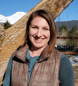 photo of Alexis Robertson on a clear day with mount shasta in the background